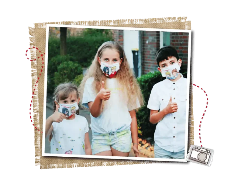 Drei Kinder mit der Nase- und Mundbedeckung der Alster-Detektive